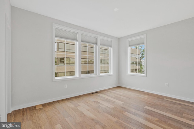 11724 Paysons Way, Reston, VA 20191 - unfurnished room with light wood-type flooring and baseboards