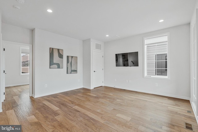 11724 Paysons Way, Reston, VA 20191 - unfurnished living room featuring light wood-style flooring and recessed lighting