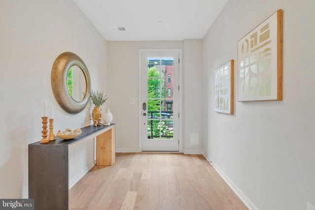 11724 Paysons Way, Reston, VA 20191 - entryway featuring light wood-type flooring and baseboards