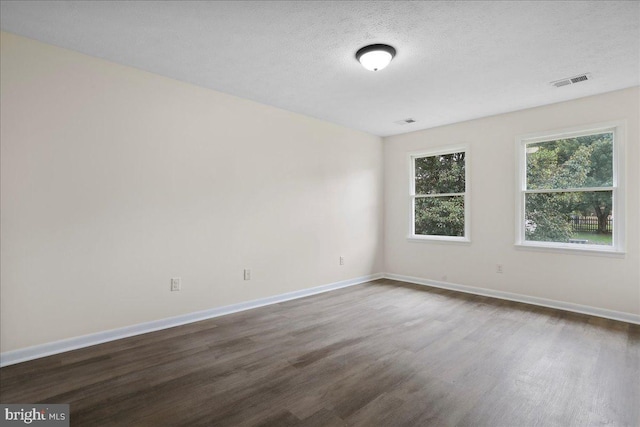 116 Somerset Dr, Stephens City, VA 22655 - spare room featuring dark wood finished floors and a textured ceiling