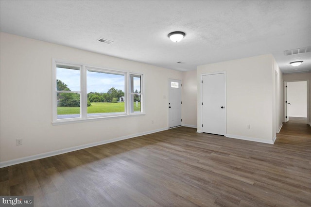 116 Somerset Dr, Stephens City, VA 22655 - foyer entrance featuring wood finished floors and a textured ceiling