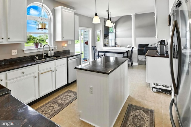 70 Marjessa Dr, Gilbertsville, PA 19525 - kitchen featuring stainless steel appliances, plenty of natural light, white cabinetry, and light tile patterned floors