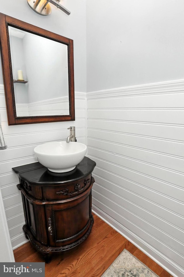 70 Marjessa Dr, Gilbertsville, PA 19525 - bathroom featuring vanity, a wainscoted wall, and wood finished floors