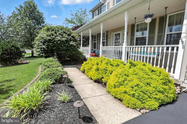 70 Marjessa Dr, Gilbertsville, PA 19525 - entrance to property with covered porch and a yard