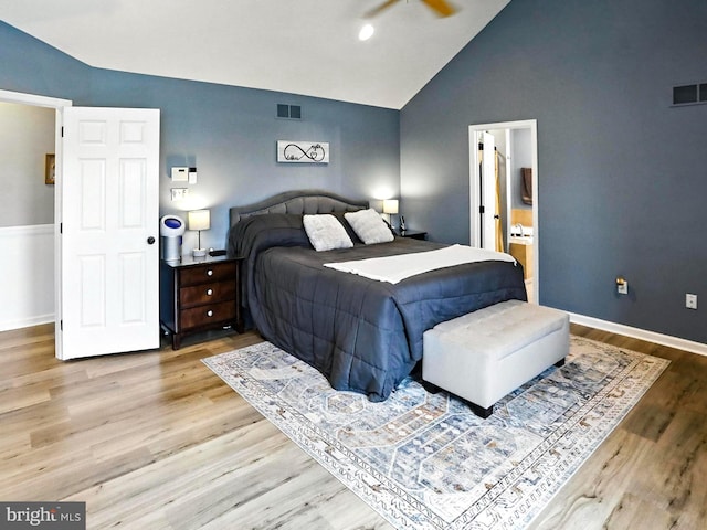 70 Marjessa Dr, Gilbertsville, PA 19525 - bedroom featuring vaulted ceiling, light wood-type flooring, and ensuite bathroom