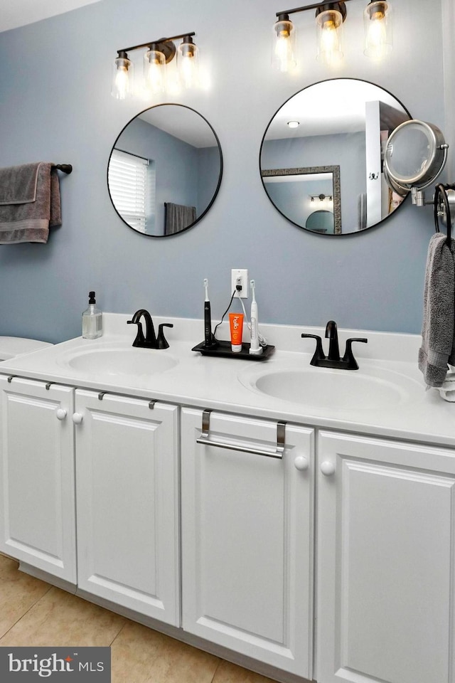 70 Marjessa Dr, Gilbertsville, PA 19525 - full bathroom with double vanity and tile patterned flooring