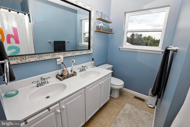 70 Marjessa Dr, Gilbertsville, PA 19525 - full bath featuring healthy amount of natural light, double vanity, and tile patterned floors