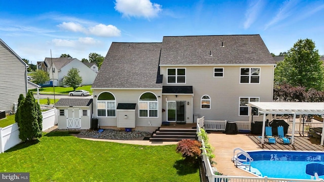 70 Marjessa Dr, Gilbertsville, PA 19525 - back of property with a wooden deck, a pergola, and roof with shingles