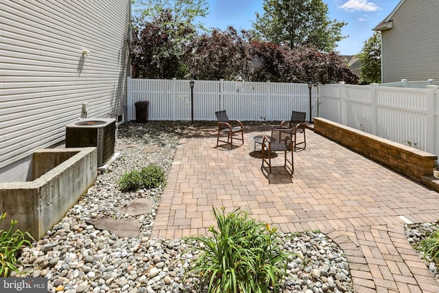 70 Marjessa Dr, Gilbertsville, PA 19525 - fenced backyard with a patio and an outdoor fire pit