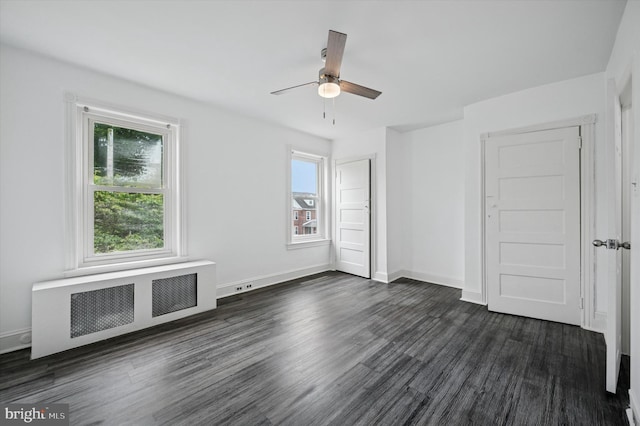 208 Edgemont Ave, Ardmore, PA 19003 - unfurnished bedroom featuring radiator heating unit, dark wood-style floors, and a ceiling fan