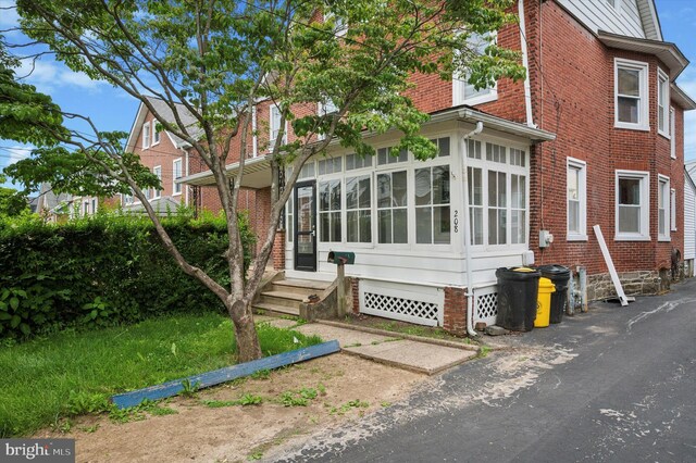 208 Edgemont Ave, Ardmore, PA 19003 - view of home's exterior with brick siding