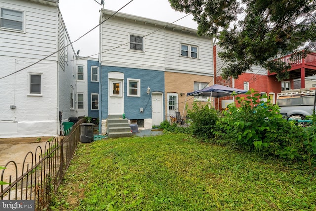 589 N Plum St, Lancaster, PA 17602 - rear view of property featuring entry steps and brick siding