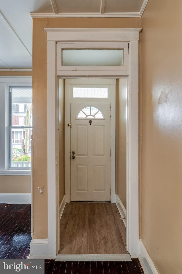 589 N Plum St, Lancaster, PA 17602 - foyer with hardwood / wood-style floors and crown molding