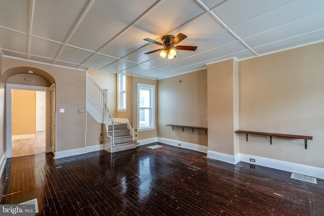 589 N Plum St, Lancaster, PA 17602 - unfurnished living room featuring ceiling fan, hardwood / wood-style floors, and stairs
