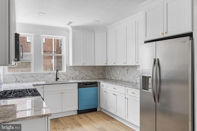 913 E Sanger St, Philadelphia, PA 19124 - kitchen with stainless steel refrigerator with ice dispenser, dishwasher, light wood finished floors, white cabinets, and decorative backsplash