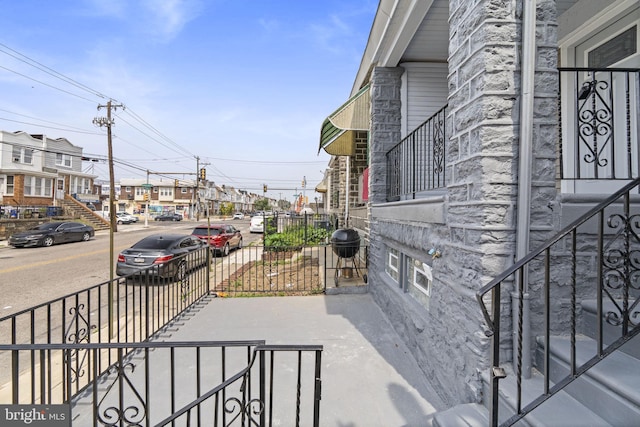 913 E Sanger St, Philadelphia, PA 19124 - view of patio featuring a residential view and a grill