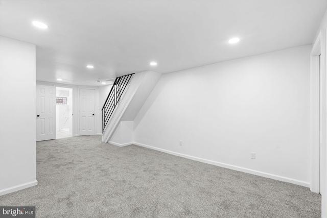 913 E Sanger St, Philadelphia, PA 19124 - finished below grade area featuring recessed lighting, carpet, and stairs