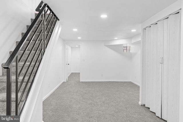 913 E Sanger St, Philadelphia, PA 19124 - finished below grade area with recessed lighting, carpet, and stairway