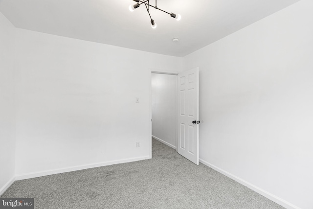 913 E Sanger St, Philadelphia, PA 19124 - empty room featuring carpet and baseboards