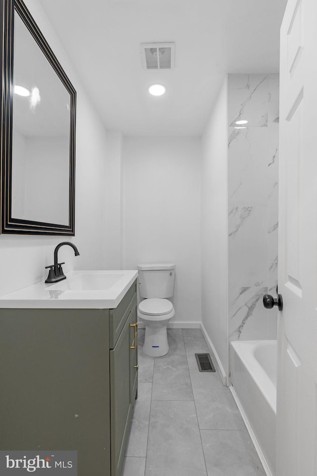 913 E Sanger St, Philadelphia, PA 19124 - full bathroom with vanity, marble look tiles, and shower / washtub combination