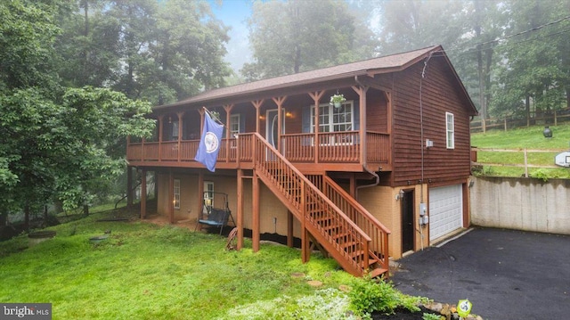 214 Salt Lick Rd, Front Royal, VA 22630 - view of front of home with asphalt driveway, an attached garage, a front lawn, and stairs