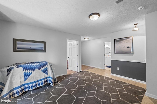 214 Salt Lick Rd, Front Royal, VA 22630 - bedroom featuring a textured ceiling and connected bathroom