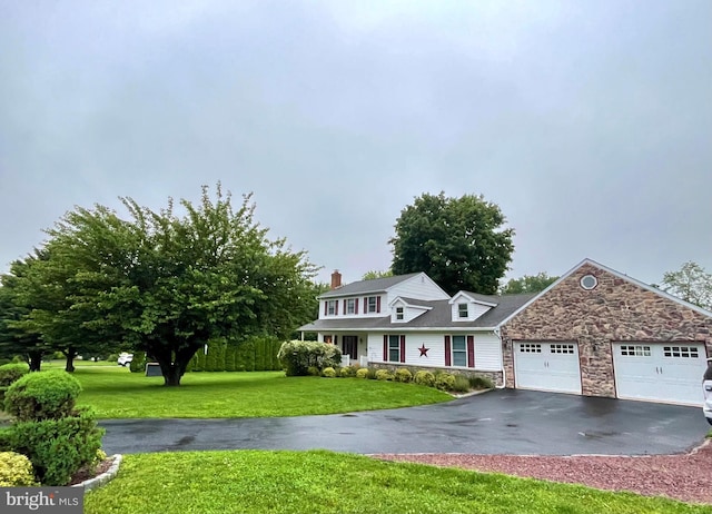 314 Grandview Cir, Honey Brook, PA 19344 - view of front of home with stone siding, an attached garage, driveway, and a front yard
