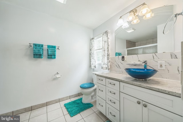 1622 Amosland Rd, Prospect Park, PA 19076 - full bath with vanity, tile patterned flooring, tasteful backsplash, and tiled shower
