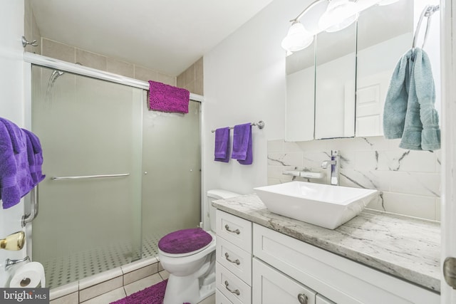 1622 Amosland Rd, Prospect Park, PA 19076 - full bathroom with vanity, a stall shower, tasteful backsplash, and tile patterned flooring