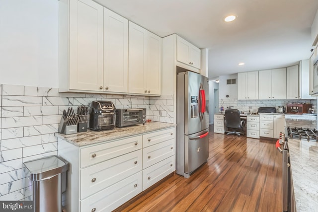 1622 Amosland Rd, Prospect Park, PA 19076 - kitchen featuring appliances with stainless steel finishes, an office area, tasteful backsplash, white cabinets, and wood finished floors