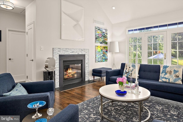 112 W Shore Dr, Milton, DE 19968 - living room with wood finished floors, vaulted ceiling, a glass covered fireplace, and recessed lighting