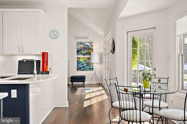 112 W Shore Dr, Milton, DE 19968 - dining space featuring wood finished floors and lofted ceiling