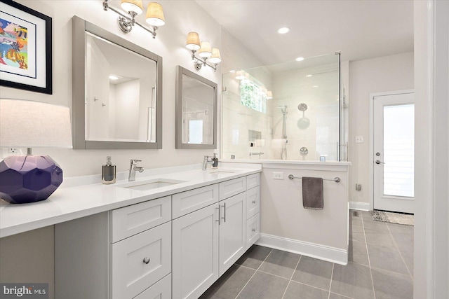 112 W Shore Dr, Milton, DE 19968 - full bath with tile patterned flooring, double vanity, a tile shower, and recessed lighting