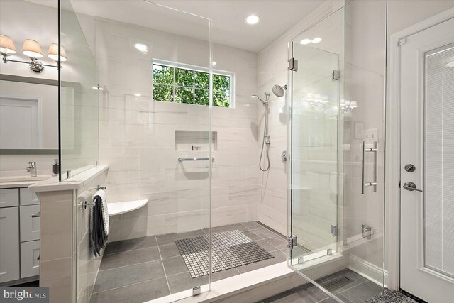 112 W Shore Dr, Milton, DE 19968 - bathroom with a shower stall, vanity, tile patterned floors, a freestanding bath, and recessed lighting