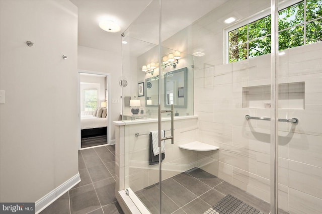112 W Shore Dr, Milton, DE 19968 - ensuite bathroom featuring tile patterned floors, a shower stall, and vanity