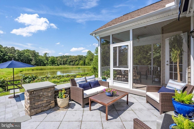 112 W Shore Dr, Milton, DE 19968 - view of patio / terrace with a water view, outdoor lounge area, and a sunroom