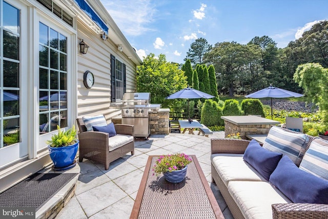 112 W Shore Dr, Milton, DE 19968 - view of patio with an outdoor hangout area and exterior kitchen