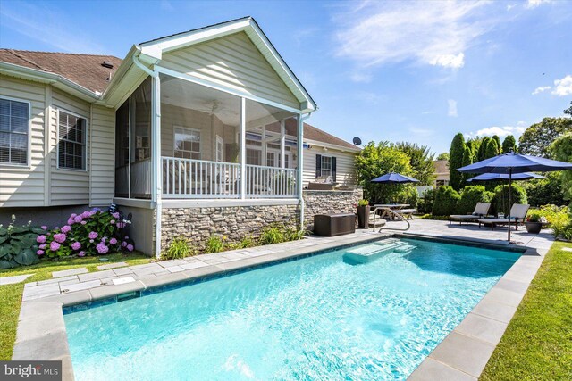 112 W Shore Dr, Milton, DE 19968 - swimming pool featuring a sunroom and a patio