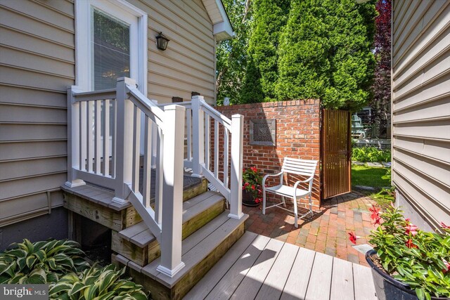 112 W Shore Dr, Milton, DE 19968 - wooden deck with a patio area
