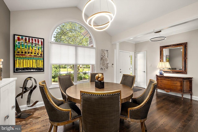 112 W Shore Dr, Milton, DE 19968 - dining room featuring lofted ceiling, ornate columns, and dark wood-style flooring