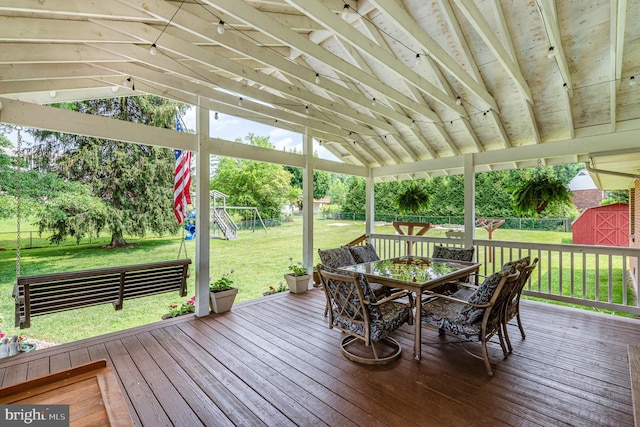 3508 Garrett Ct, Aberdeen, MD 21001 - wooden terrace featuring outdoor dining space, a playground, and a fenced backyard