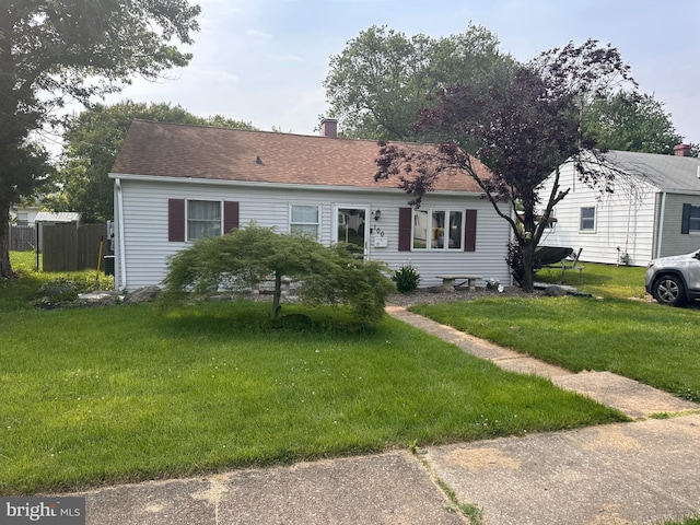100 Garrett Rd, Glen Burnie, MD 21060 - ranch-style house featuring a chimney, a front lawn, and a shingled roof