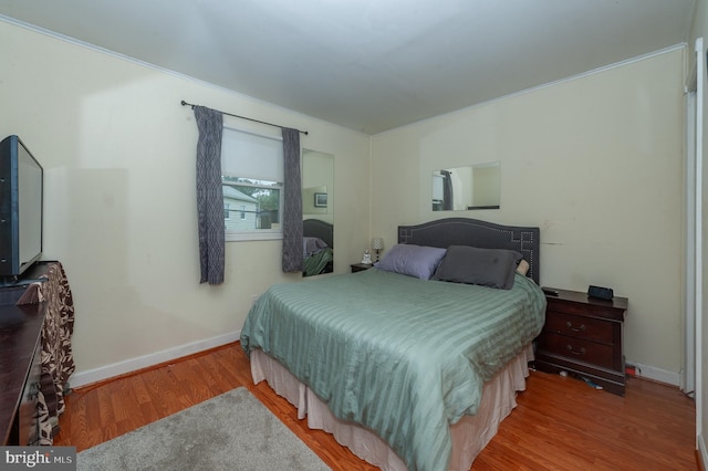 100 Garrett Rd, Glen Burnie, MD 21060 - bedroom with wood finished floors and crown molding