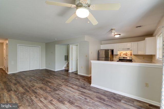 2312 Slater Hill Ln E Unit 62, York, PA 17406 - kitchen with appliances with stainless steel finishes, white cabinetry, dark wood-type flooring, under cabinet range hood, and a ceiling fan
