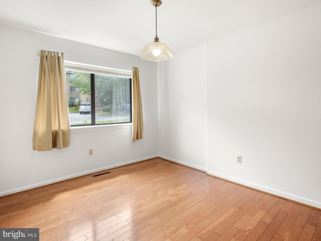 398 Lynetree Dr Unit 11-D, West Chester, PA 19380 - spare room with light wood-style floors and baseboards