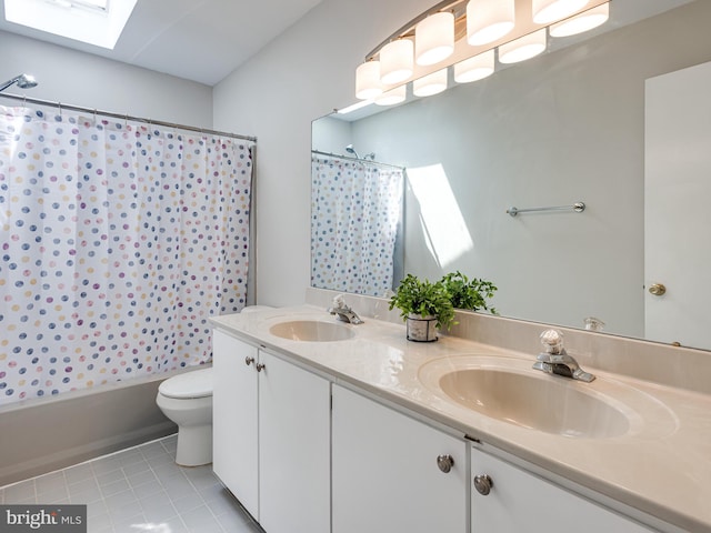 398 Lynetree Dr Unit 11-D, West Chester, PA 19380 - bathroom with a skylight, double vanity, tile patterned floors, and shower / tub combo