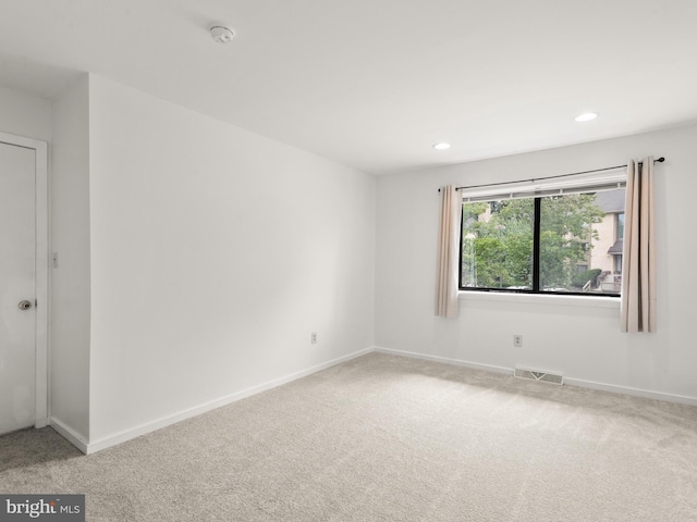 398 Lynetree Dr Unit 11-D, West Chester, PA 19380 - carpeted empty room featuring a smoke detector and recessed lighting