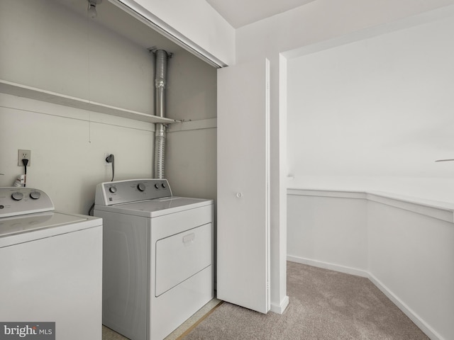 398 Lynetree Dr Unit 11-D, West Chester, PA 19380 - laundry room featuring washing machine and dryer and light carpet