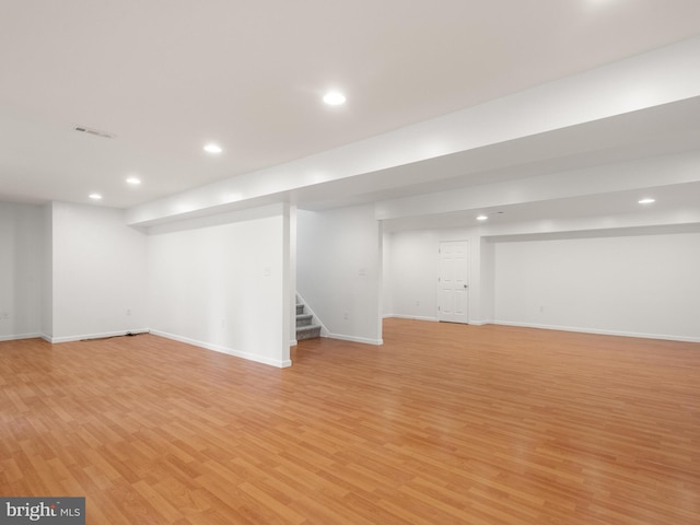 398 Lynetree Dr Unit 11-D, West Chester, PA 19380 - finished basement with recessed lighting, light wood finished floors, and stairs