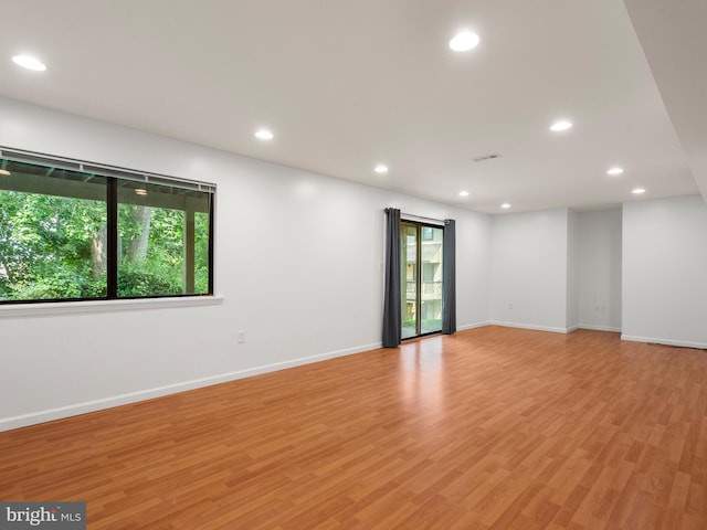 398 Lynetree Dr Unit 11-D, West Chester, PA 19380 - spare room with light wood finished floors and recessed lighting